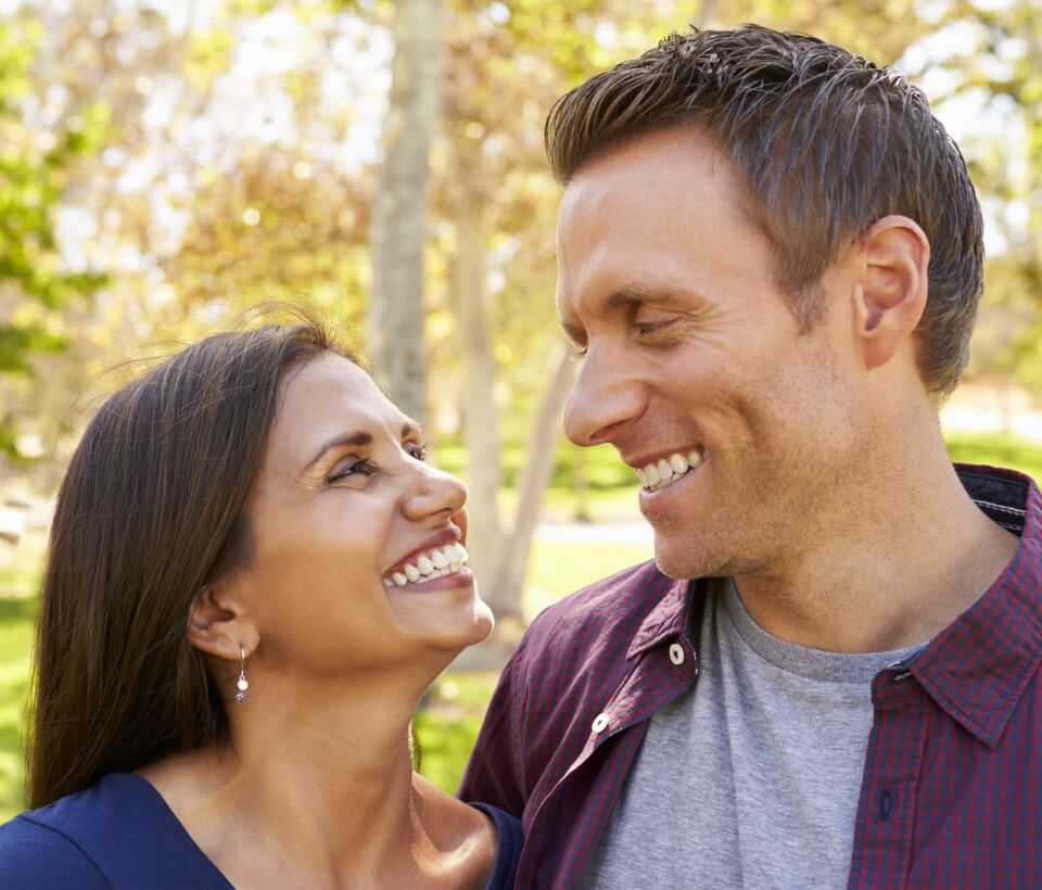 Couple smiling after getting their teeth cleaned at Anderson Family Dentist