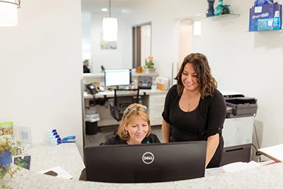 front desk finance team at Anderson Family Dentist