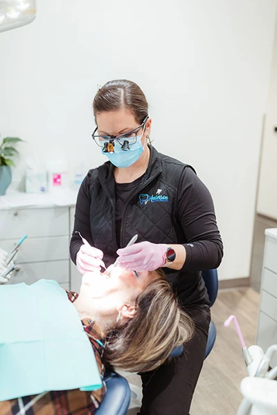 Dentist at Anderson Family Dentist working on a patient