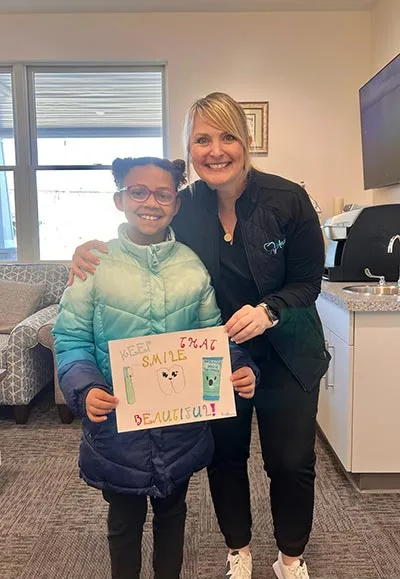 Staff member at Anderson Family Dentist with kids dentistry patient